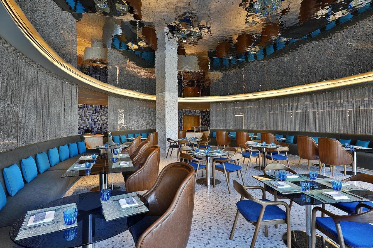 W Muscat Hotel Ngoại thất bức ảnh The interior of the restaurant